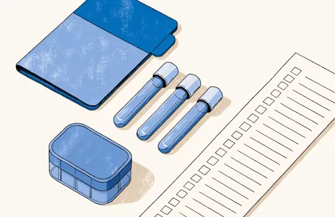 A closed folder, three laboratory tubes with blue caps, a pill organizer and a checklist with empty boxes, on a table.